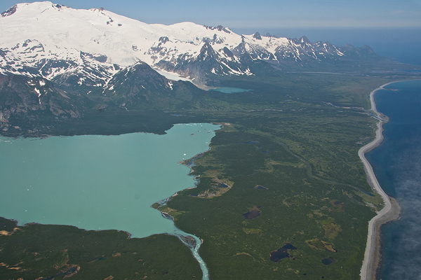 A beautiful glacial lake empties into the sea.&nbsp;