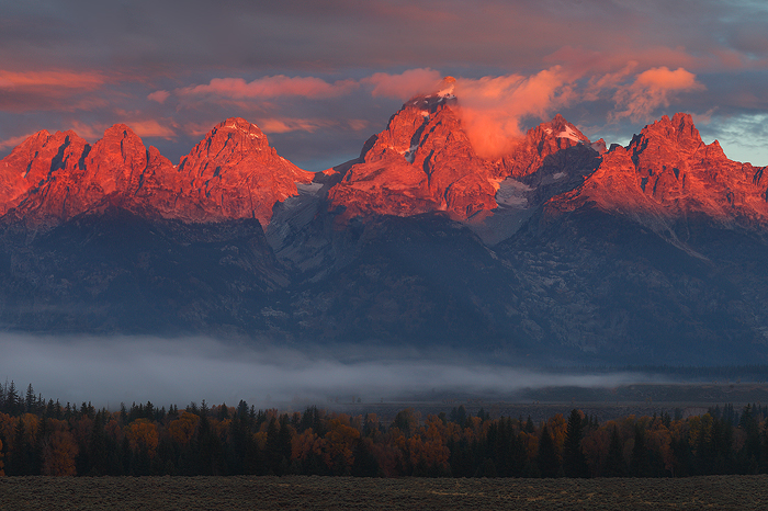 The sun came over the horizon and lit up the Tetons.